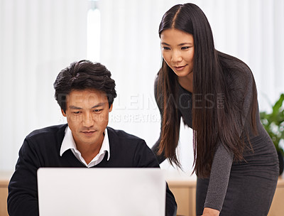 Buy stock photo Teamwork, mentor and help with laptop in office or businessman learning from support of woman. Feedback, advice and manager training asian man on computer in collaboration and reading online research