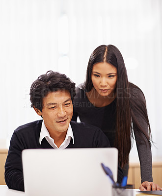 Buy stock photo Mentor, support and teamwork on laptop in office with businessman learning from help of woman. Feedback, advice and manager training asian man on computer in collaboration and reading online research