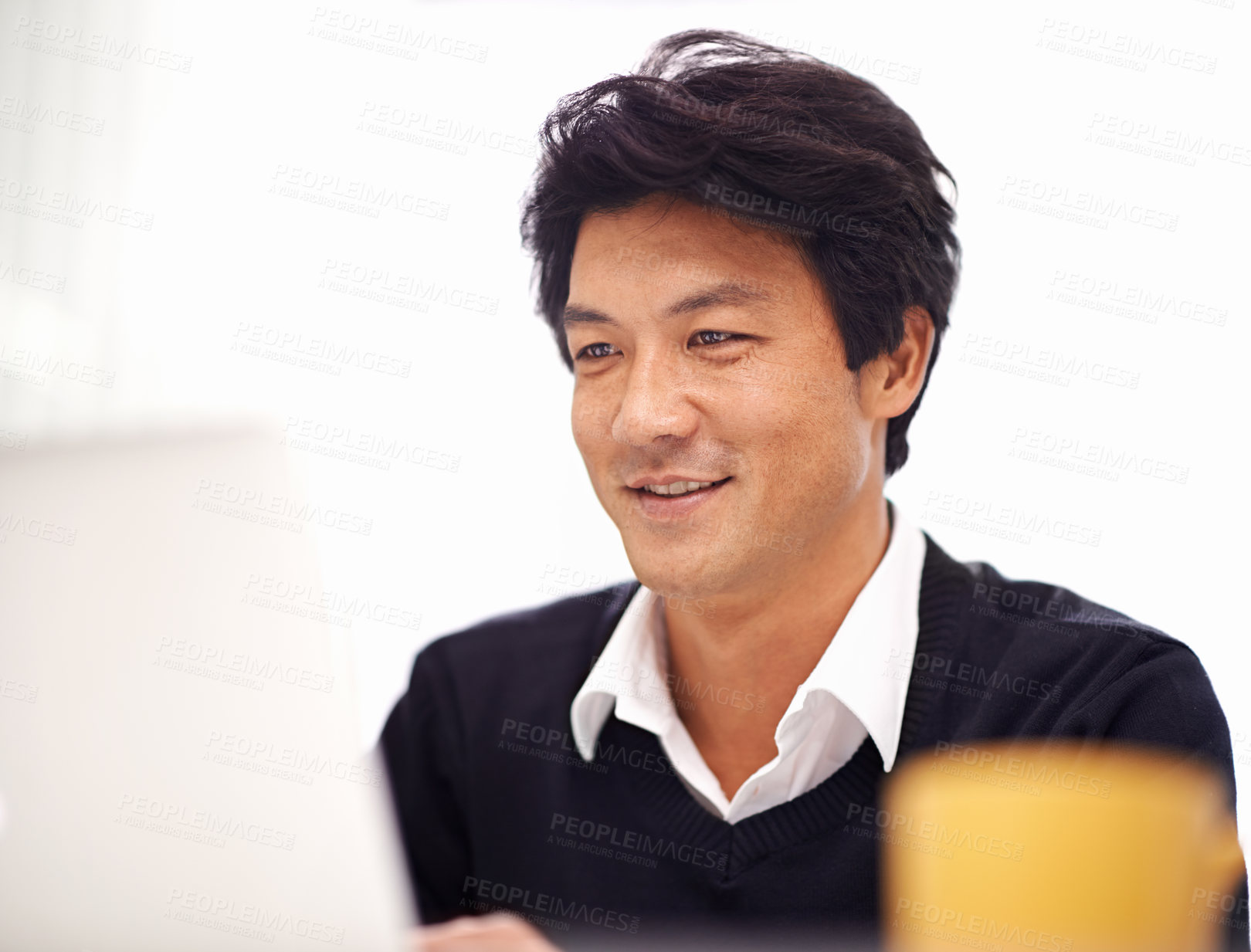 Buy stock photo Corporate, laptop and asian businessman in office for communication, chat or reading email. Professional, entrepreneur and Japanese male employee with technology for internet, website and planning 