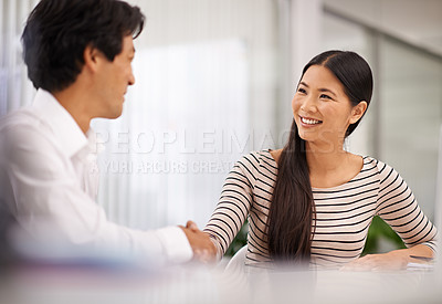 Buy stock photo Happy, business people and handshake with colleague for agreement, meeting or deal together at the office. Man and woman with smile and shaking hands for b2b, greeting or partnership at the workplace