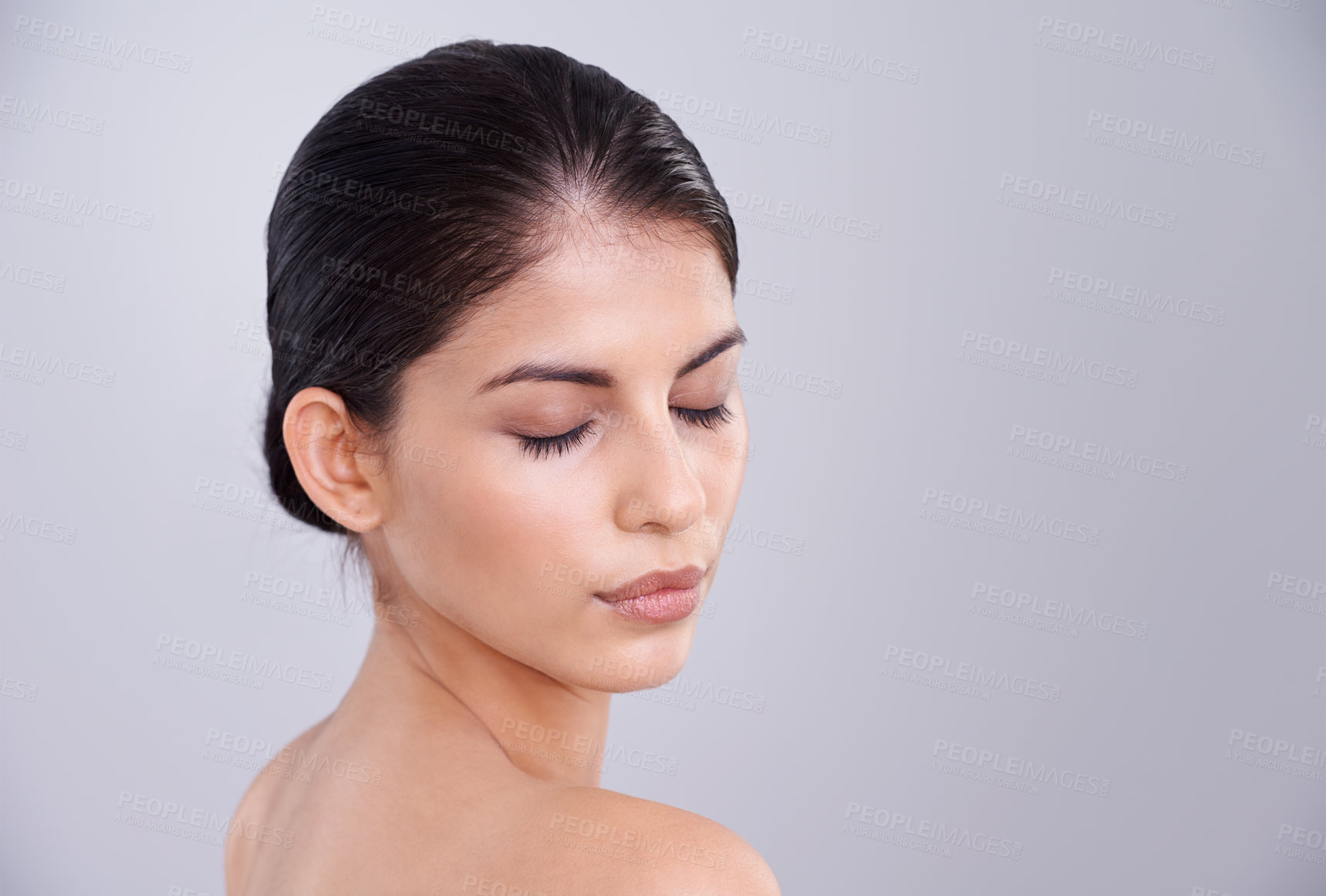 Buy stock photo Beauty, skincare and woman with eyes closed in studio, clean and natural with cosmetic care and wellness on grey background. Facial, treatment and dermatology, peace with healthy skin and shine