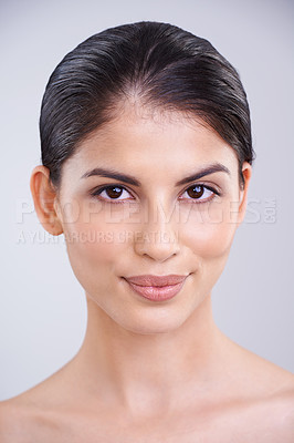 Buy stock photo Beauty, face and dermatology with woman, cosmetic care and wellness in headshot isolated on grey background. Clean, natural and shine in portrait for skincare, healthy skin and hygiene in studio