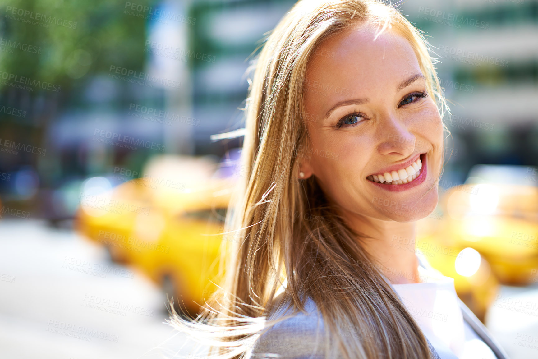 Buy stock photo A cropped shot of a beautiful woman walking around the city in the day time