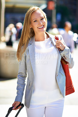 Buy stock photo Businesswoman, portrait and suitcase for city travel or corporate, commute or airport. Female person, face and smile with luggage or urban hotel building for downtown trip,  pedestrian or career