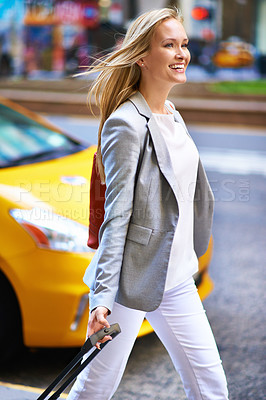 Buy stock photo Business woman, baggage and happy on travel in city with vision on journey in metro, suit and outdoor. Person, smile and luggage for walk, direction and sidewalk with traffic on street in New York
