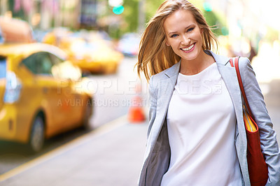 Buy stock photo A gorgeous young woman with her handbag in New York