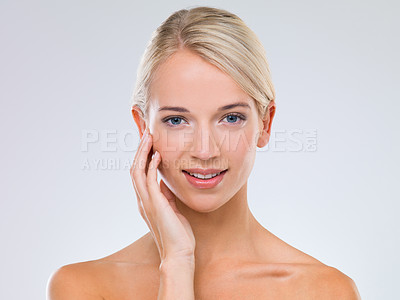 Buy stock photo Woman, skincare and wellness in studio portrait with hand on face for results, touch and natural by white background. Girl, person and model with cosmetics, facial glow and transformation with smile