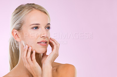 Buy stock photo Woman, skincare and beauty in studio with space, results and hands of face with natural glow by pink background. Girl, person and model with cosmetics, mock up and facial transformation with thinking