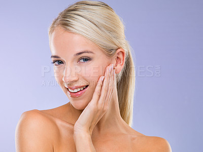Buy stock photo Woman, portrait and skincare treatment with hand for healthy beauty, purple background or confidence. Female person, face and smile or makeup cosmetics as dermatology wellness, studio or mockup space