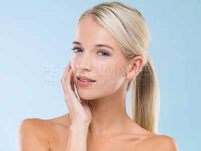 Buy stock photo Health, skincare and portrait of woman in studio with dermatology, glow and facial treatment. Cosmetic, natural and female model with beauty, wellness and face routine isolated by blue background.