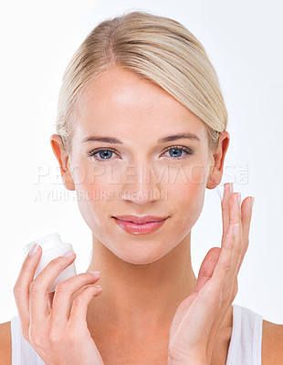 Buy stock photo Woman, portrait and moisturiser product for skincare healthy or dermatology wellness, cream or white background. Female person, face and hand with lotion in studio for self care, sunscreen or mockup
