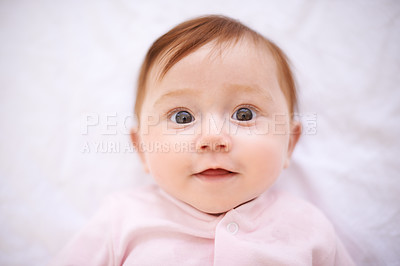 Buy stock photo Happy, baby and portrait of girl on bed with smile for childhood, development and relax in nursery. Newborn, rest and face of kid with peace for growth, sweet infant and comfortable from above