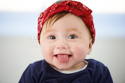 Buy stock photo Portrait, tongue and cheerful baby fashion in family home, cute and trendy street style on curious girl toddler. Creative, child development and growth, adorable headband accessory on happy smile kid