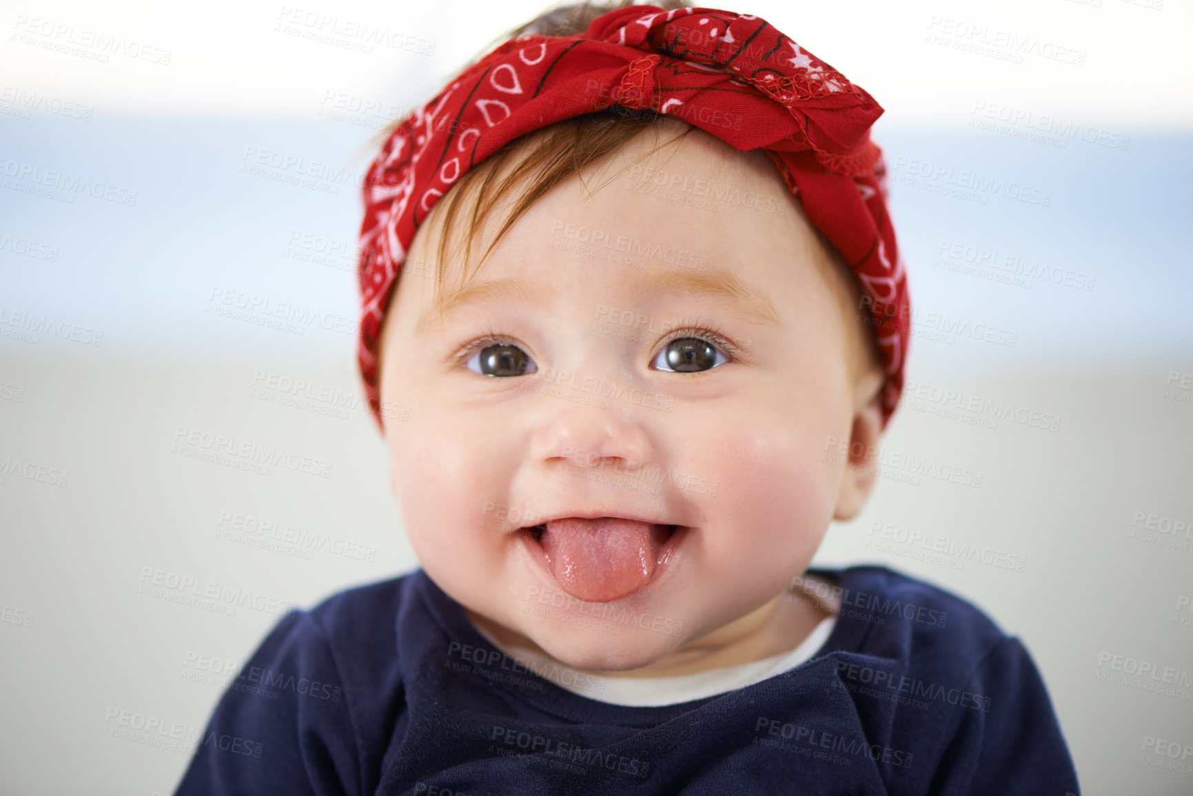 Buy stock photo Portrait, tongue and cheerful baby fashion in family home, cute and trendy street style on curious girl toddler. Creative, child development and growth, adorable headband accessory on happy smile kid