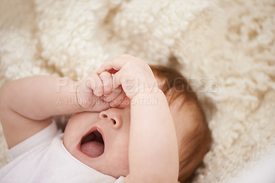 Buy stock photo Shot of an adorable baby yawning