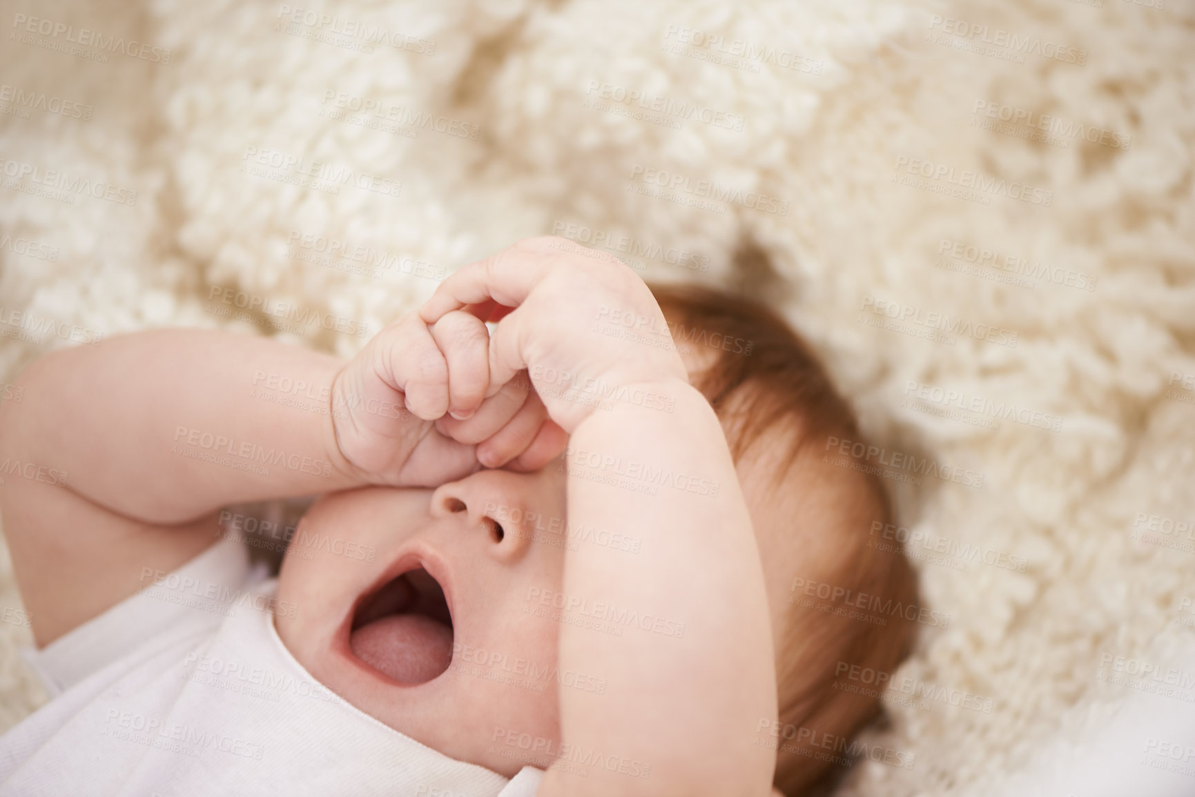 Buy stock photo Shot of an adorable baby yawning