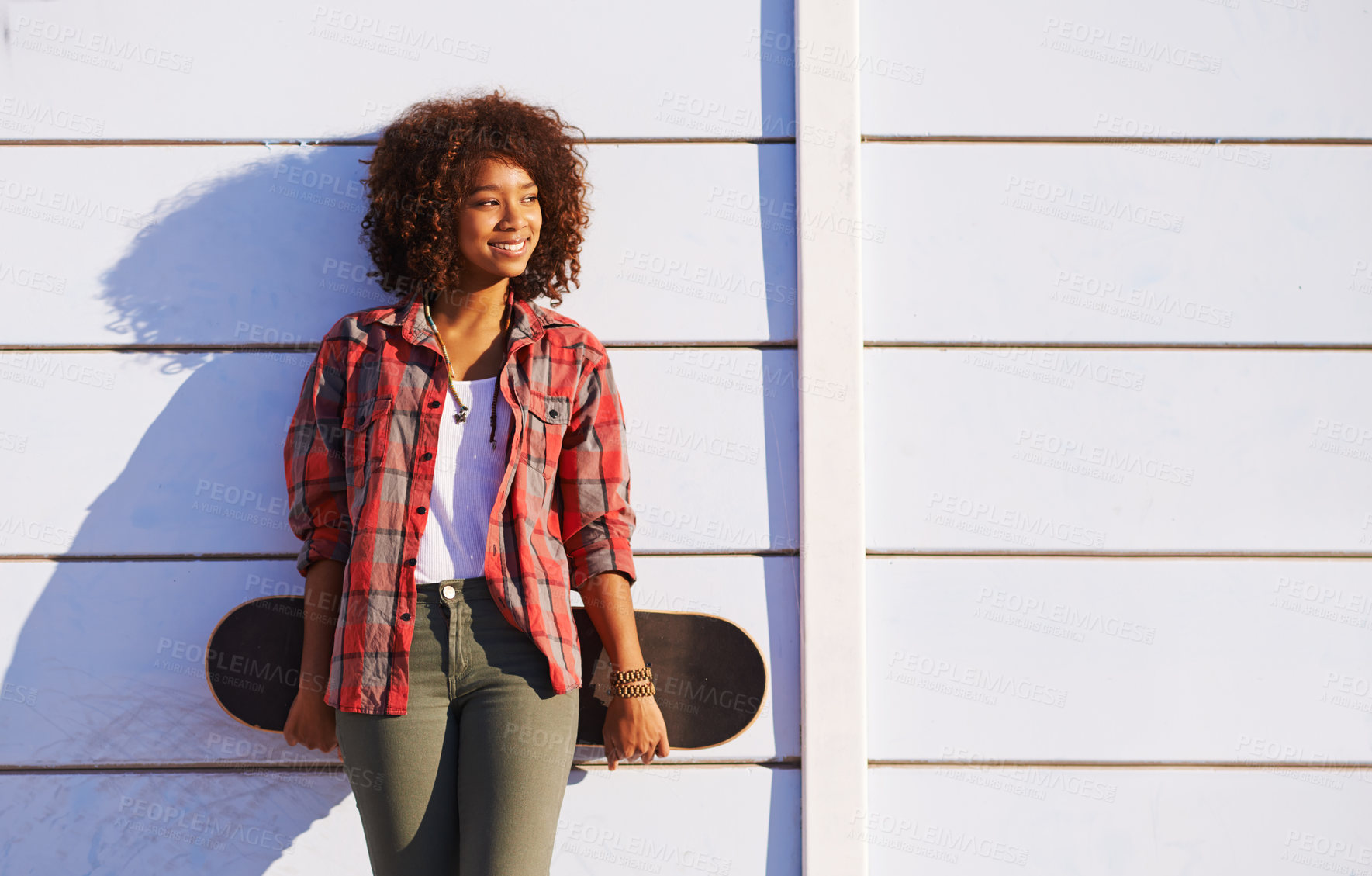 Buy stock photo Skateboard, fashion and black woman in skatepark for exercise, training and skating in city. Skater, smile and happy female person for trendy, edgy style and hipster clothing in San Francisco