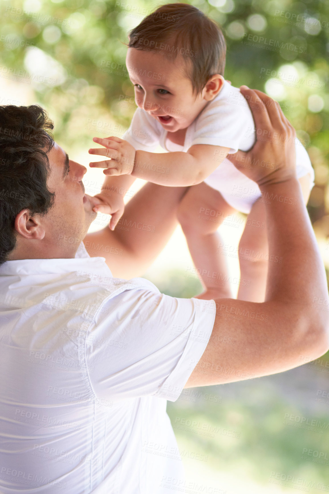 Buy stock photo Nature, happy and father playing with baby for care, outdoor games and enjoy fun bonding time together in family park. Child growth, fatherhood and infant with playful dad, papa or man smile for kid
