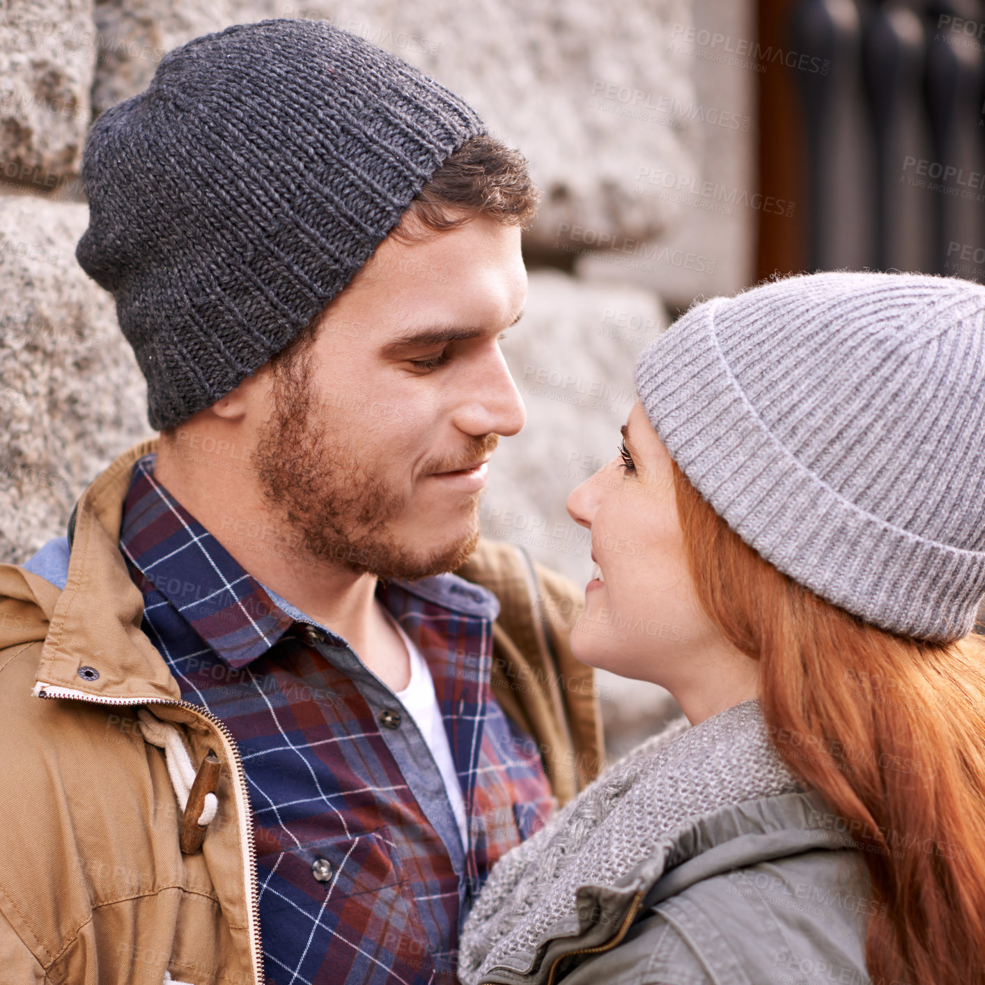 Buy stock photo Couple, love and smile with closeup in outdoor at sidewalk or against in cold weather, together and support in London. Relationship, date and bonding for romance with soulmate, care and happiness 