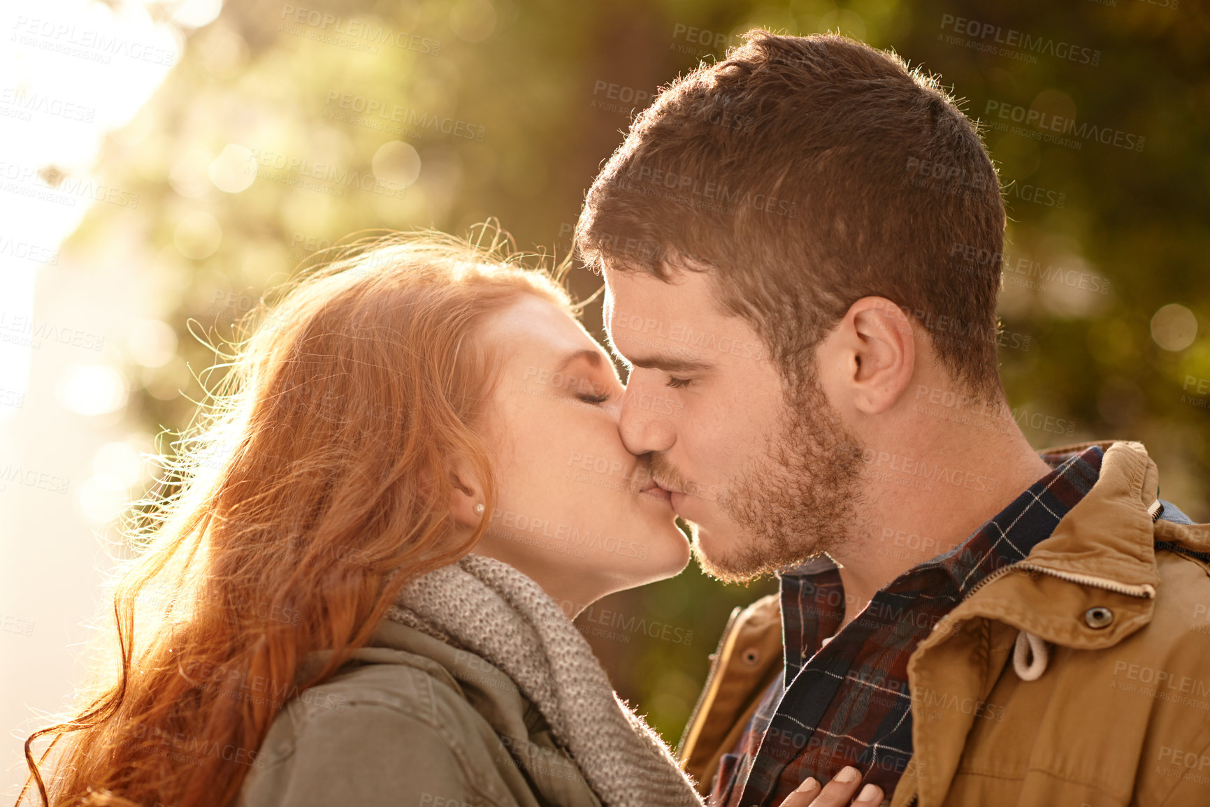 Buy stock photo Couple, kiss and date in park with love in nature on holiday adventure or relax on vacation in woods. Trust, man and woman with support and care in marriage and travel forest together in spring