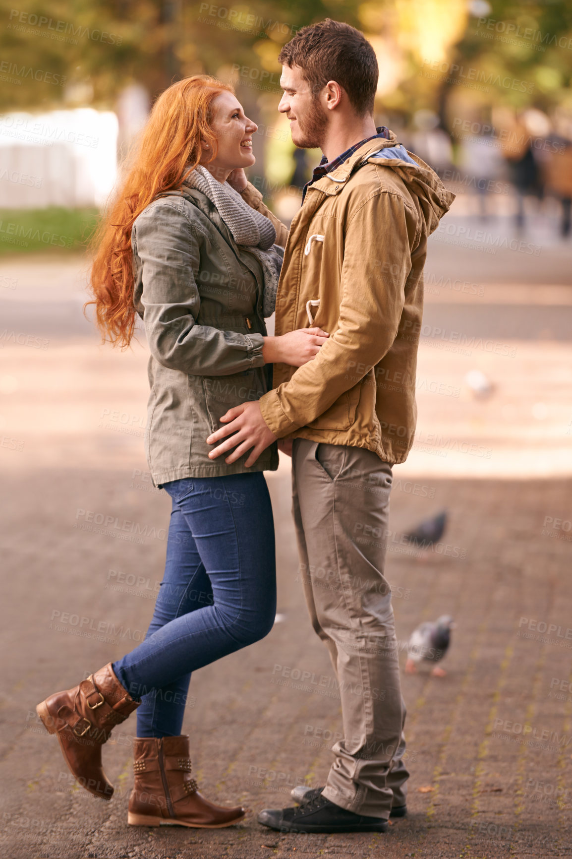 Buy stock photo Couple, love and smile with date at park in cold weather or winter, together and support in London. Relationship, commitment and bonding for romance with soulmate, care and happiness for affection