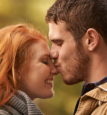 Buy stock photo Date, kiss and couple closeup with love in park nature on holiday adventure or relax on vacation in woods. Together, man and woman with support and care in marriage and travel forest in morning