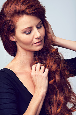 Buy stock photo Ginger, beauty and woman with hair care in studio, background and mockup. Cosmetics, makeup and dye for natural shine and red color on hairstyle or calm girl with healthy skincare from dermatology