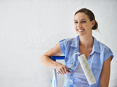 Buy stock photo Cropped shot of a young woman taking a break from painting