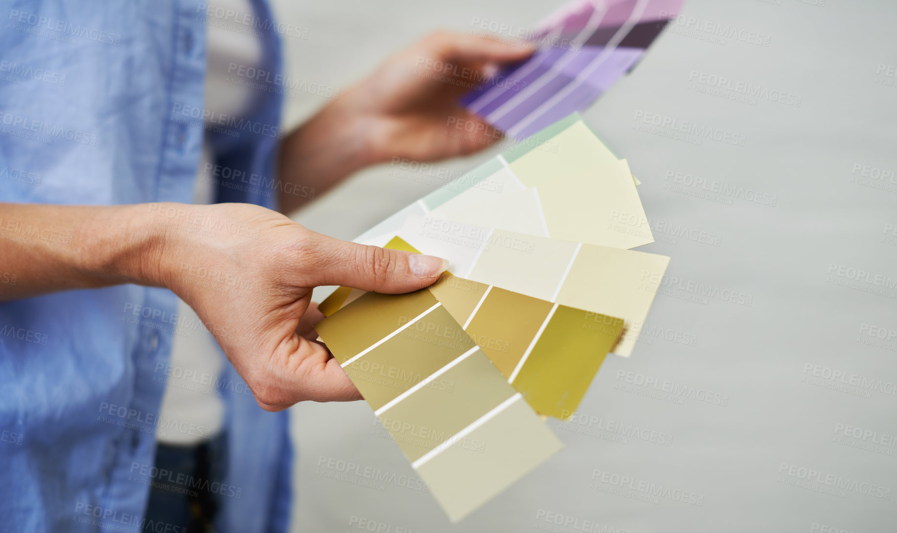 Buy stock photo Shot of a woman fanning out color swatches