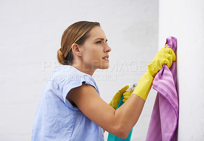 Buy stock photo Woman, gloves and cleaning walls in home, disinfection and remove dirt or bacteria for maintenance. Female person, housekeeeping and wash with detergent or sanitation, maid and chemical for germs