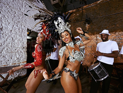 Buy stock photo Women, samba dancer and smile at show, carnival and band with fashion, culture and creativity in nightclub. Girl, people and dancing with music, stage and tradition for celebration in Rio de Janeiro