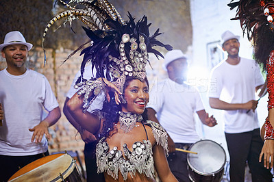 Buy stock photo Celebration, dance and exotic female dancer performing with a band at mardi gras or cultural festival. Performance, costume and woman dancing with rhythm to live music at a carnival in Rio de janeiro
