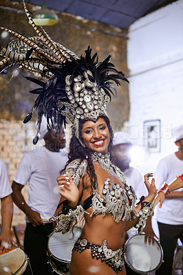 Buy stock photo Dance, portrait and exotic woman dancer performing with a band at mardi gras or cultural festival. Performance, costume and female performer dancing to live music at a celebration carnival in Brazil.
