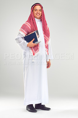 Buy stock photo Portrait, Islamic man and books for education, knowledge and guy isolated on white studio background. Muslim, male and student with journals, smile and confident for studying, learning and university