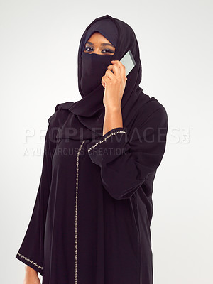 Buy stock photo Muslim woman on a phone call in studio global, international communication of culture and design. Islam, arabic and traditional model talking on smartphone for networking isolated on white background