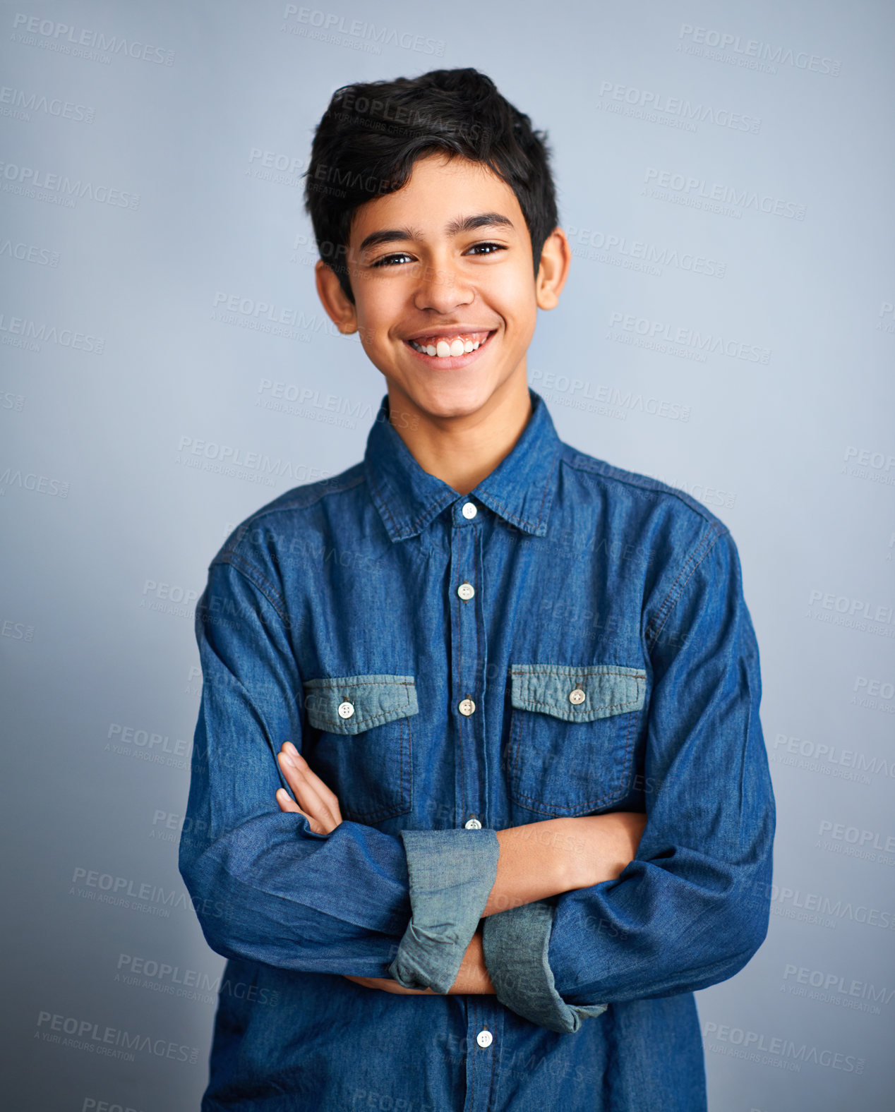 Buy stock photo Smile, happy and portrait of teenager with fashion feeling confident arms crossed isolated in a gray studio background. Content, happiness and young Arab teen male person or teen with style