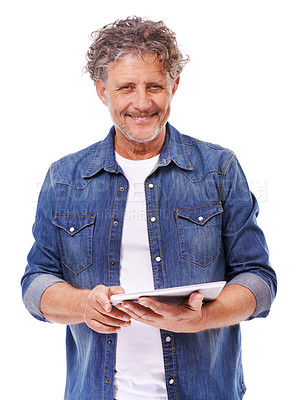 Buy stock photo Studio shot of a mature man holding up a digital tablet isolated on white