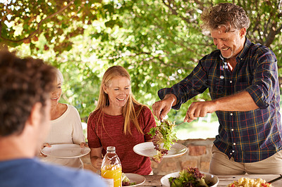 Buy stock photo Food, party and happy with family at lunch and serving for health, bonding and celebration. Thanksgiving, social and event with group of people eating together for dining, generations and wellness