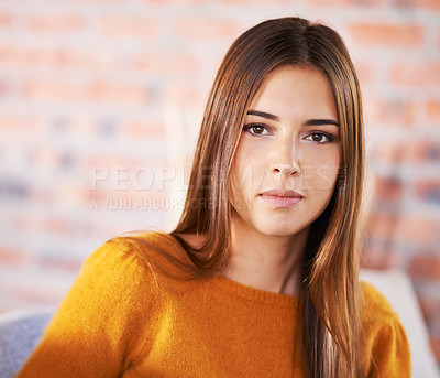 Buy stock photo A young woman inside her house