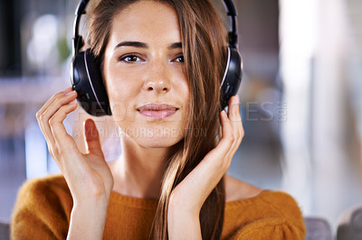 Buy stock photo Woman, headphones and portrait for audio on couch, relax and streaming radio for music or sound. Female person, home and listening on sofa for peace, comfortable and hearing jazz playlist on weekend