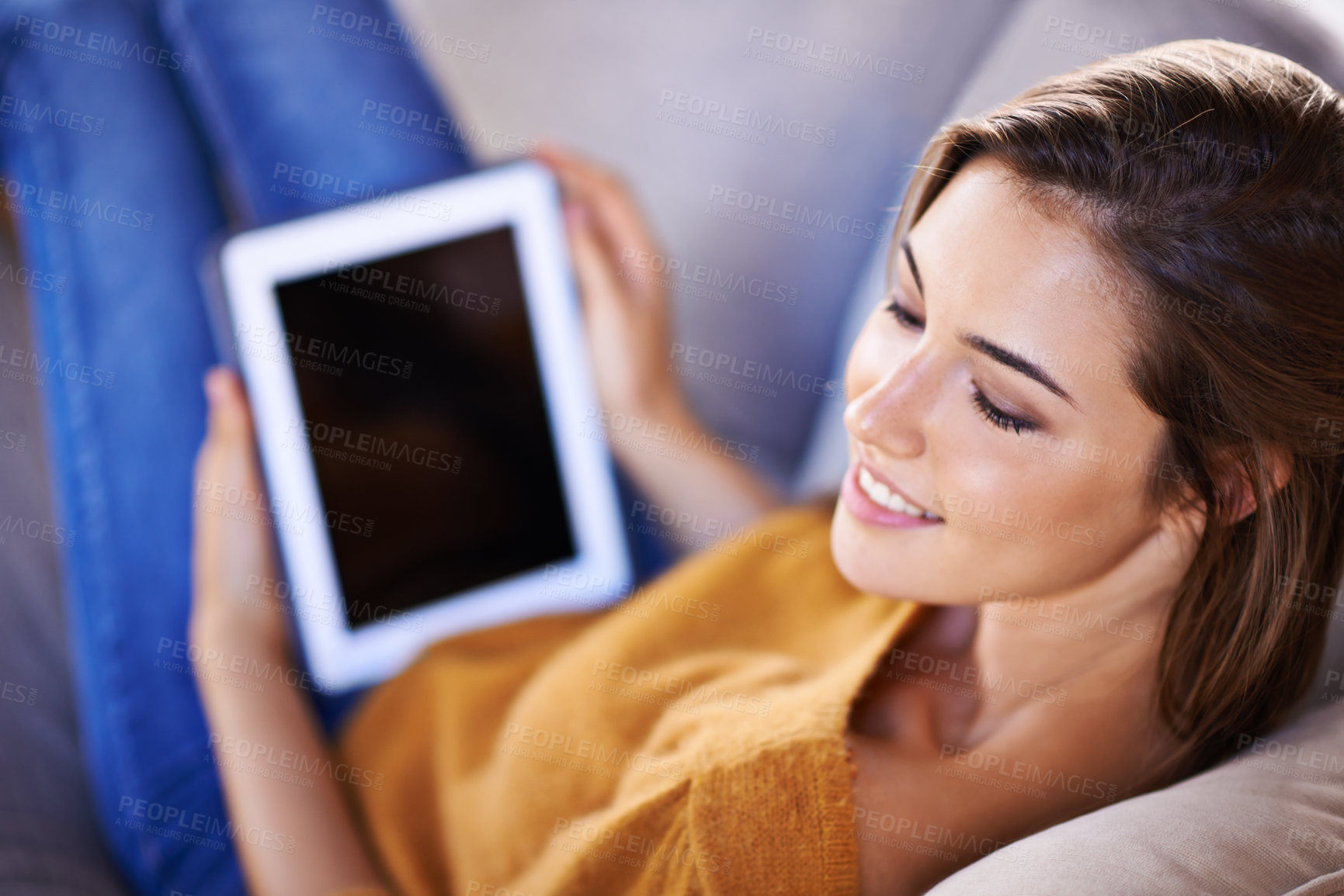 Buy stock photo Woman, calm and relax on couch with tablet for internet browsing or social media, online shopping and website. Female person, digital technology and sofa to lounge with peaceful connectivity 