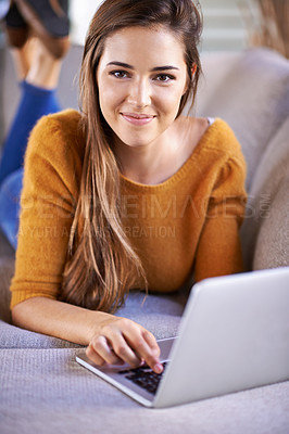 Buy stock photo Happy, home and woman with a laptop, portrait and connection with writer in a living room. Person on couch, apartment and girl with a computer and research with online blog, technology and network