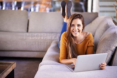 Buy stock photo Happy, home and woman with a laptop, portrait and connection with typing in a lounge. Person on a sofa, apartment and girl with a computer and research with online blog and news with smile and relax