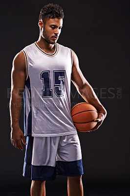 Buy stock photo Man, sports and basketball player in studio for training, competition and fitness on black background. Professional athlete, career and exercise with ball for game, hobby and healthy model in mockup