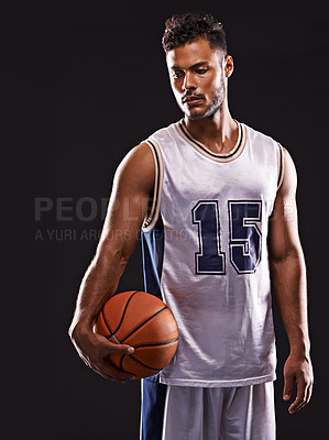 Buy stock photo Man, action and basketball player in studio for fitness, competition and training on black background. Professional athlete, career and exercise with ball for game, hobby and healthy model in sport