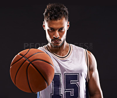 Buy stock photo Studio shot of a basketball player against a black background
