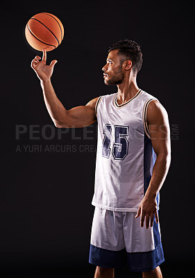 Buy stock photo Man, finger and basketball player in studio as sports athlete for workout competition, training or black background. Male person, ball and exercise champion or professional, fitness or mockup space