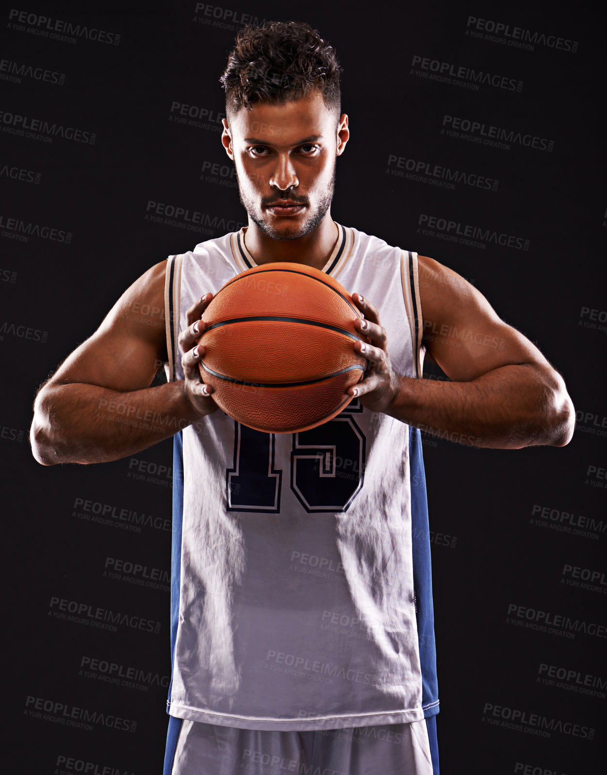 Buy stock photo Studio shot of a basketball player against a black background