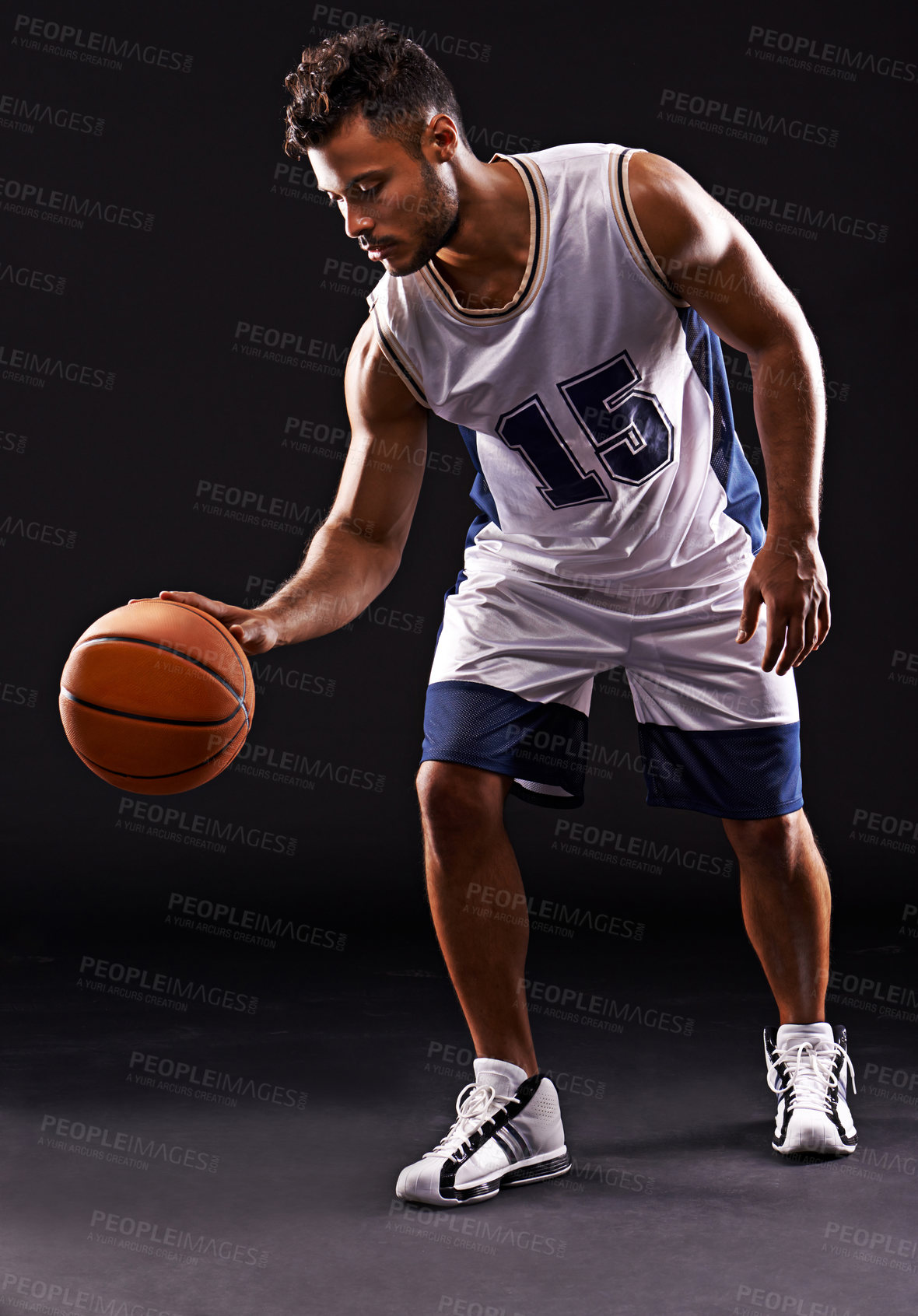 Buy stock photo Man, playing and basketball player in studio for sports athlete for workout competition, training or black background. Male person, bounce and exercise performance or professional, fitness or mockup