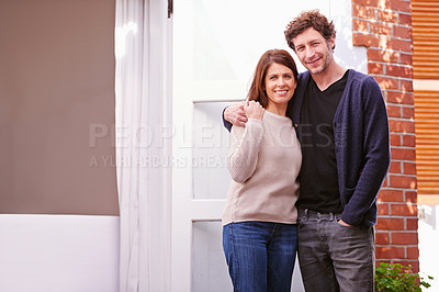 Buy stock photo Happy, portrait of couple embracing by home for marriage, love and care holding hands. Smile, excited and mature man and woman hugging by door outdoor of new house for real estate or property.